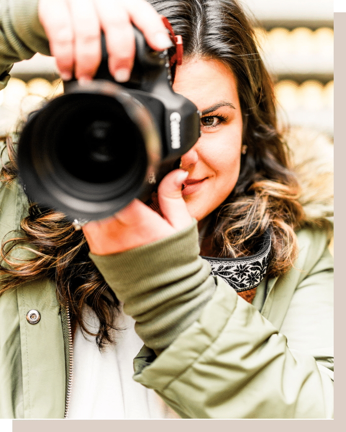 Petkovic Contact Image - Andrea smiling while taking a picture